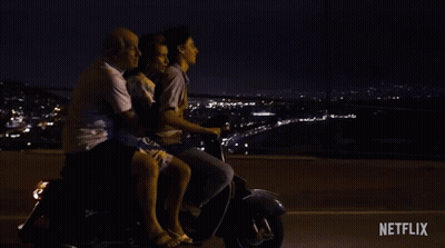 A Group Of People Are Riding A Scooter With The Words " Do N't Worry Mom " Written On The Bottom GIF