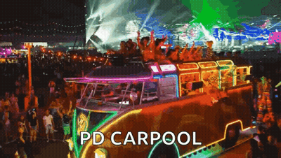 A Group Of People Are Riding On Top Of A Bus At A Festival . GIF