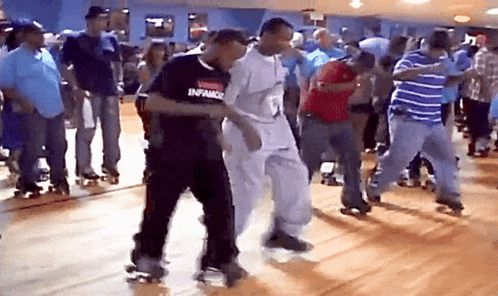 A Group Of People Are Rollerblading And One Of Them Is Wearing A Shirt That Says Infance On It GIF