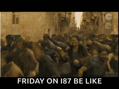 A Group Of People Are Running Down A Street With The Words Friday On 187 Be Like Below Them GIF