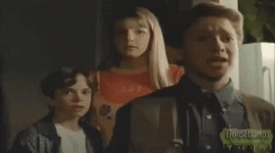 A Group Of People Are Running In A Living Room With Goosebumps Written On The Bottom Of The Screen GIF