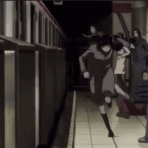 A Group Of People Are Running Towards A Subway Car GIF