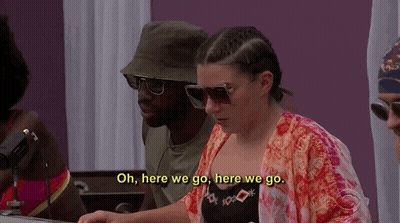 A Group Of People Are Sitting Around A Table And One Of Them Is Saying " Oh Here We Go Here We Go " . GIF
