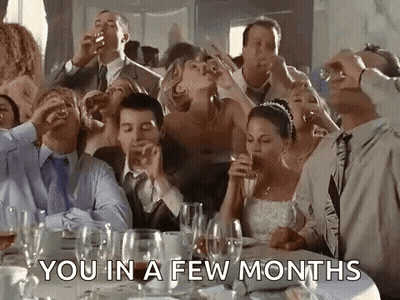 A Group Of People Are Sitting At A Table Drinking Wine And Toasting . GIF