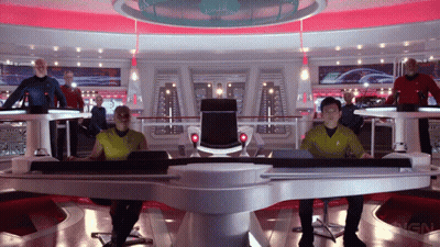 A Group Of People Are Sitting At A Table With The Word Ign On The Bottom Right GIF