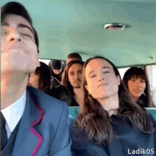 A Group Of People Are Sitting In A Car With The Name Ladik05 On The Bottom Right GIF
