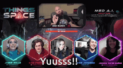 A Group Of People Are Sitting In Front Of A Screen With Things Space Written On It GIF