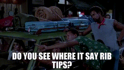 A Group Of People Are Standing Around A Car With Luggage On Top Of It And The Words Do You See Where It Says Rib Tips . GIF