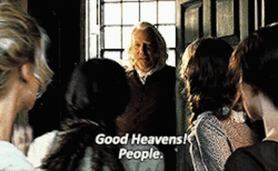 A Group Of People Are Standing Around A Man Who Is Talking To Them And The Words `` Good Heavens People '' Are On The Sc GIF