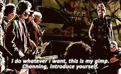 A Group Of People Are Standing Around A Man Who Says " I Do Whatever I Want " GIF