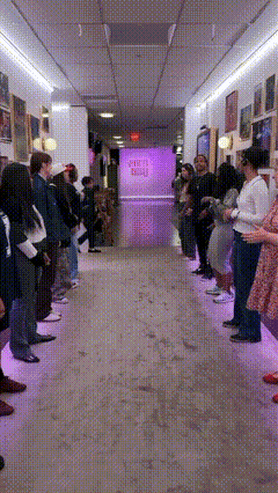 A Group Of People Are Standing In A Hallway In Front Of A Sign That Says ' Sleep ' GIF