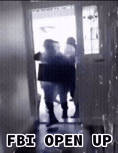 A Group Of People Are Standing In A Hallway With The Words Fbi Open Up On The Bottom GIF