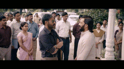 A Group Of People Are Standing In A Line And One Of Them Is Wearing A Pink Saree GIF