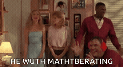 A Group Of People Are Standing In A Living Room With A Man Wearing Headphones And A Woman In A Dress . GIF