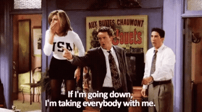 A Group Of People Are Standing In A Room With A Sign That Says Jouets On It . GIF