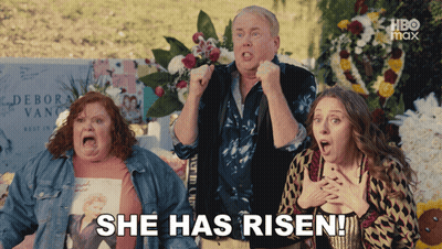 A Group Of People Are Standing In Front Of A Grave With The Words She Has Risen Written On It GIF