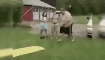 A Group Of People Are Standing In Front Of A House And A Car . GIF