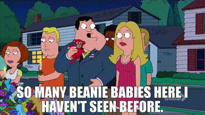 A Group Of People Are Standing In Front Of A House And A Man Is Holding A Stuffed Animal . GIF