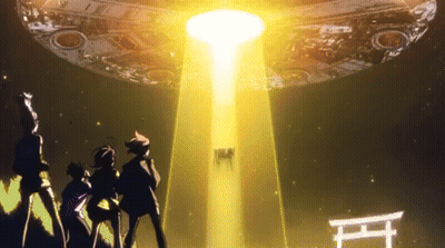 A Group Of People Are Standing In Front Of A Large Object With A Light Coming From It GIF