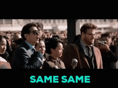 A Group Of People Are Standing In Front Of A Microphone And The Words Same Same Are On The Screen GIF