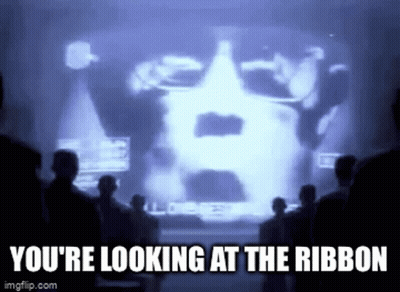 A Group Of People Are Standing In Front Of A Screen That Says You 'Re Looking At The Ribbon . GIF
