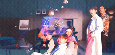 A Group Of People Are Standing In Front Of A Sign That Says " House Party " GIF