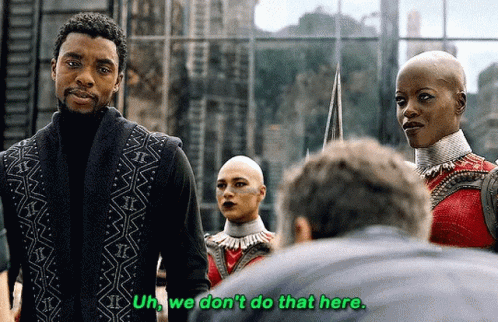 A Group Of People Are Standing Next To Each Other And One Of Them Is Saying Uh We Don 'T Do That Here GIF