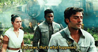 A Group Of People Are Standing Next To Each Other And One Of Them Is Talking About Bad News That 'S What Happened . GIF