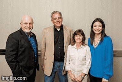 A Group Of People Are Standing Next To Each Other And Smiling For The Camera . GIF