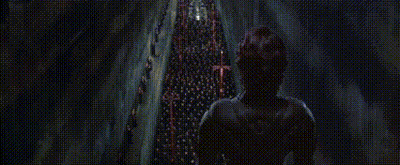 A Group Of People Are Standing Next To Each Other In A Dark Room With The Words `` All Hail Legi '' Written On The Scree GIF