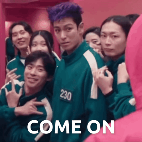 A Group Of People Are Standing Next To Each Other In A Room With The Words Come On Written On The Bottom . GIF