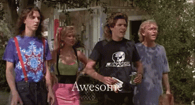 A Group Of People Are Standing Next To Each Other In Front Of A House . One Of The Men Is Holding A Gun . GIF