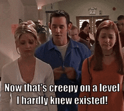A Group Of People Are Walking In A Hallway With The Caption Now That 'S Creepy GIF