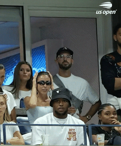 A Group Of People Are Watching A Tennis Match Sponsored By Us Open . GIF