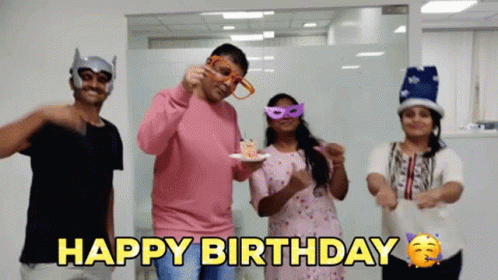 A Group Of People Celebrating A Birthday With The Words Happy Birthday Written In Yellow GIF