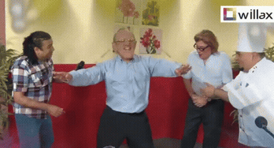 A Group Of People Dancing In Front Of A Willax Sign GIF