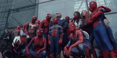 A Group Of People Dressed In Spider Man Costumes Pose For A Photo GIF