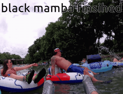 A Group Of People Floating Down A River With The Words Black Mamba Finished Below Them GIF