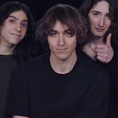 A Group Of People Giving A Thumbs Up Sign GIF