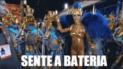 A Group Of People In Colorful Costumes With The Words Sente A Bateria Written Below Them GIF