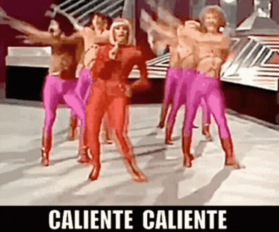 A Group Of People In Pink Pants Are Dancing With The Words Caliente Caliente On The Bottom GIF