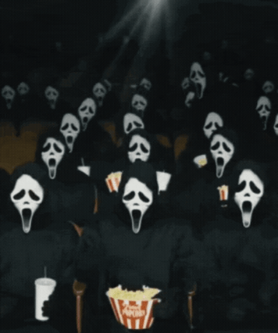 A Group Of People In Scream Masks Watching A Movie GIF