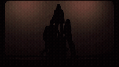 A Group Of People In Suits And Ties Pose For A Photo GIF
