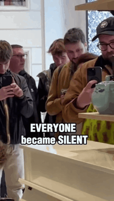 A Group Of People Looking At Their Phones With The Words Everyone Became Silent Above Them GIF