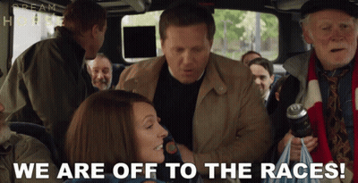 a group of people on a bus with the words " we are off to the races " on the bottom