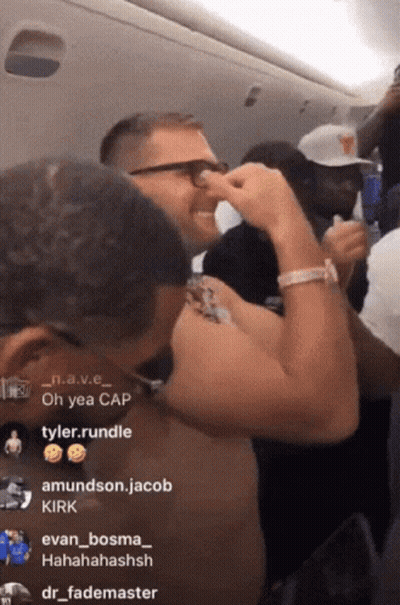 A Group Of People On A Plane With One Saying " Oh Yea Cap " On The Bottom GIF