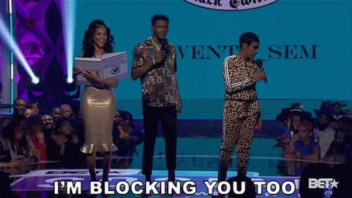 A Group Of People On A Stage With The Words I 'M Blocking You Too GIF