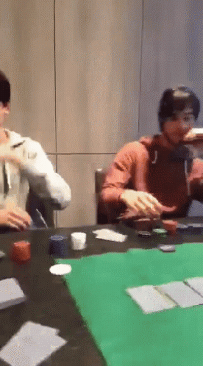 A Group Of People Playing A Game Of Poker GIF