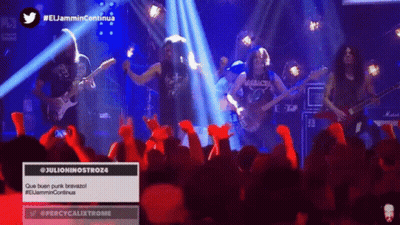 A Group Of People Playing Instruments In Front Of A Crowd With A Twitter Icon Above Them GIF