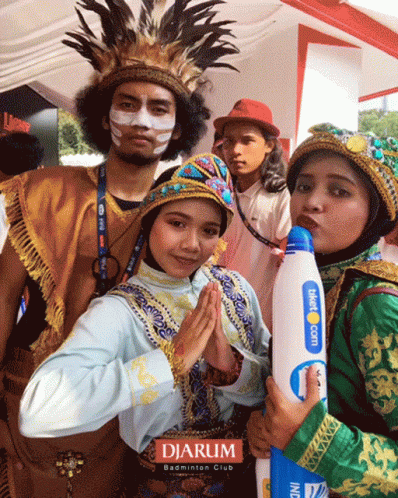 A Group Of People Posing For A Picture With The Word Djarum In The Corner GIF